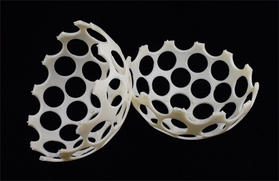 Two half-shells of an ABS flocculation ball