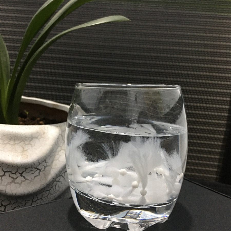 Comet fiber filter media suspended in water