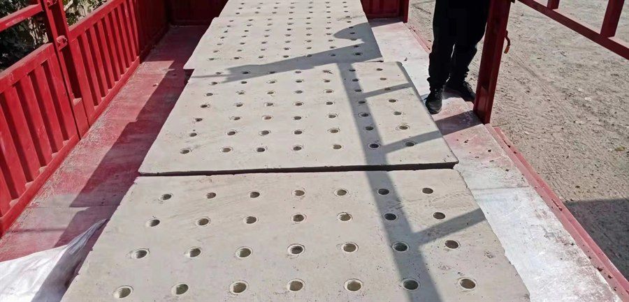 Concrete filter plates loaded on a truck for shipment
