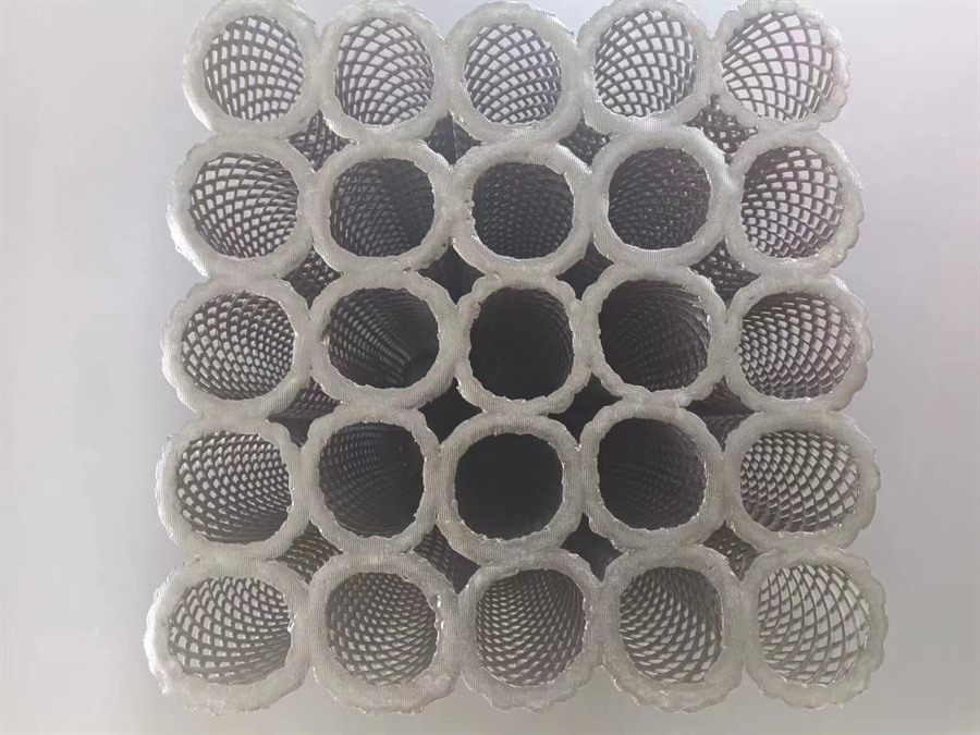 Degassing packing elements seen end-on in a five by five array