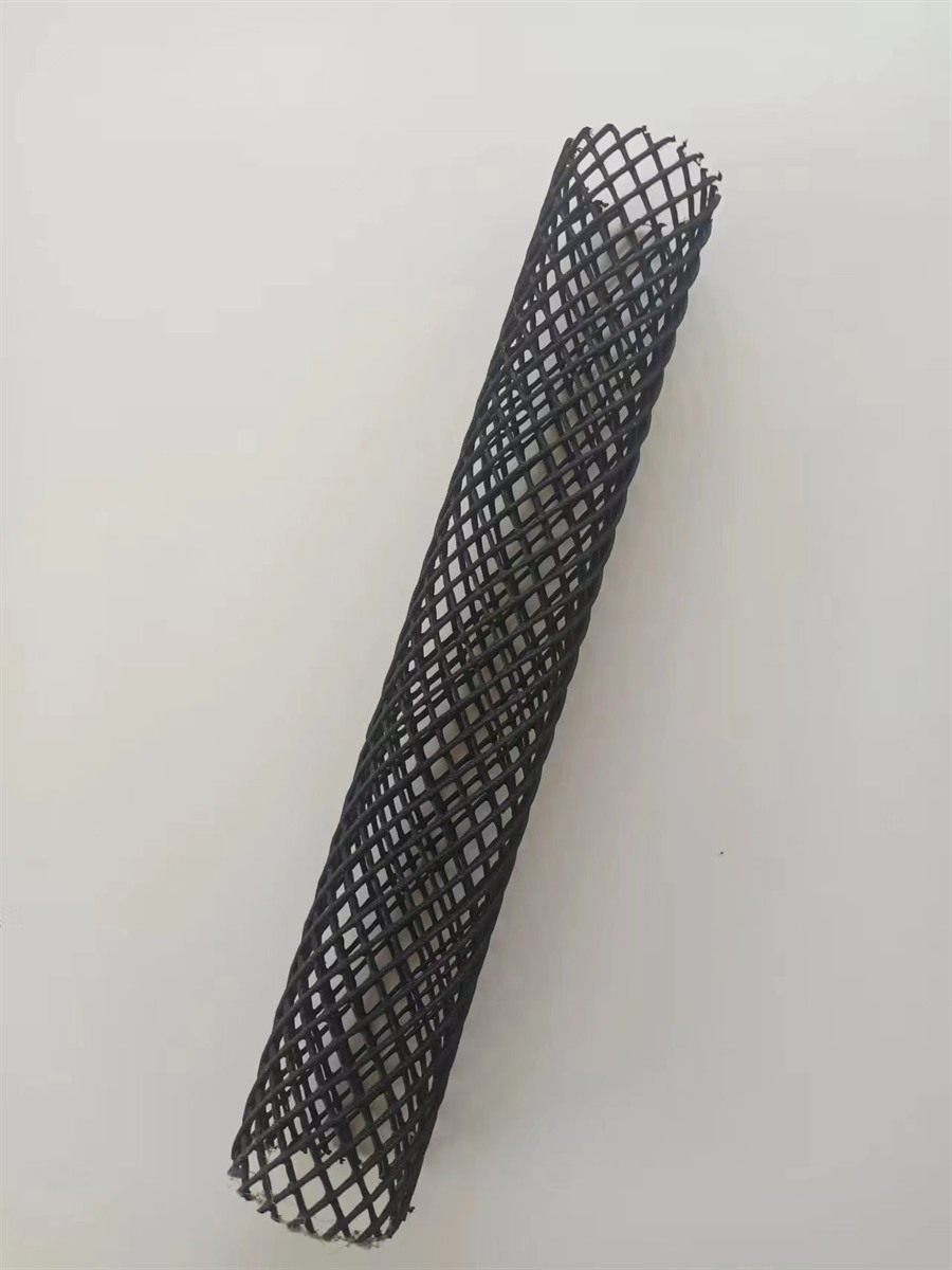 Single degassing packing mesh cylinder standing on a white background