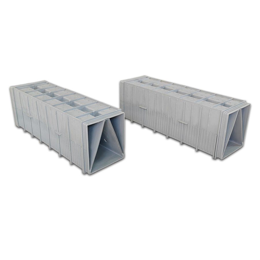 Two grey filter bricks with capping plates, studio view