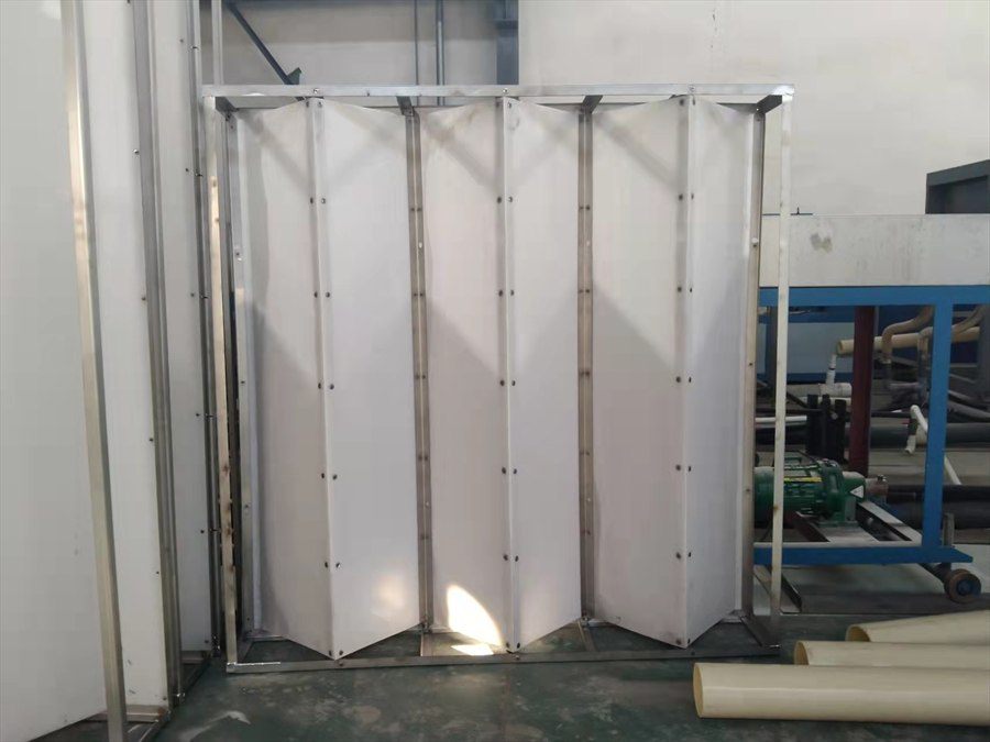 Folded-plate module inside a stainless steel frame