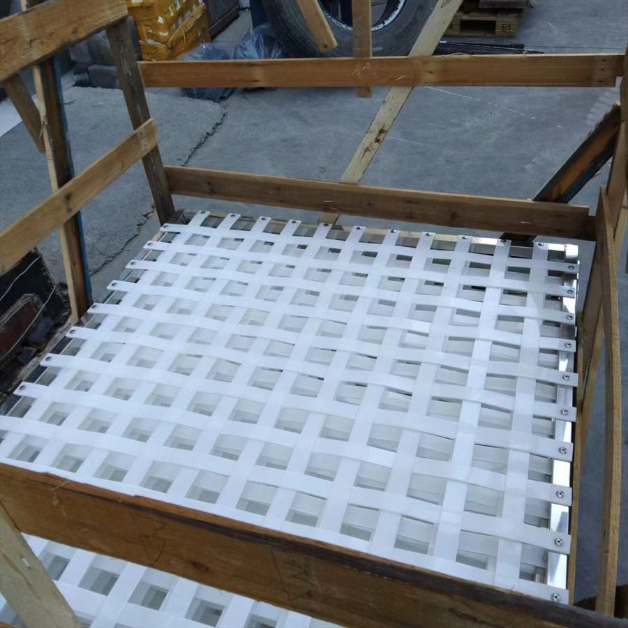 White flocculation grid panels packed in a wooden crate